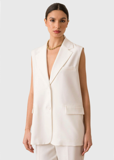 Audrey balta brīva piegriezuma veste